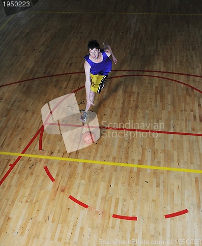 Image of basket ball game player at sport hall