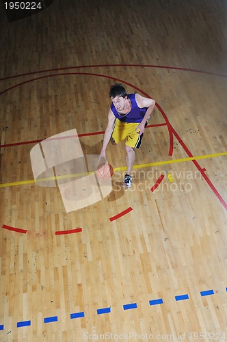 Image of basket ball game player at sport hall