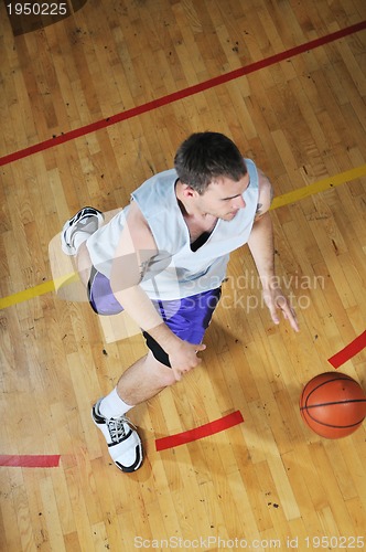 Image of basket ball game player at sport hall