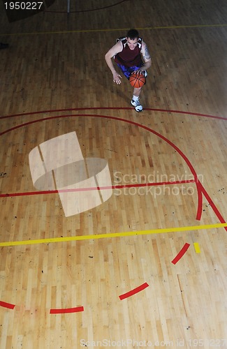 Image of basket ball game player at sport hall