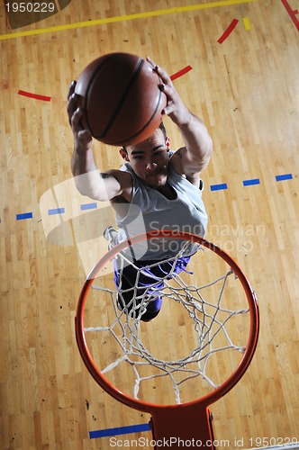 Image of basket ball game player at sport hall