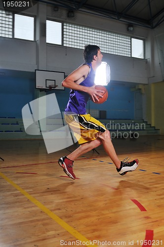 Image of basket ball game player at sport hall
