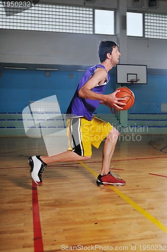 Image of basket ball game player at sport hall