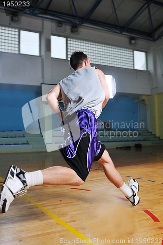 Image of basket ball game player at sport hall