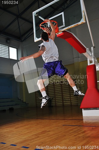 Image of basket ball game player at sport hall