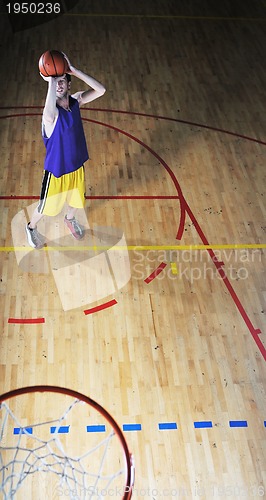 Image of basket ball game player at sport hall