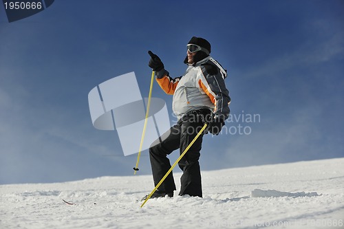 Image of skier pointing direction