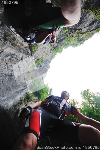 Image of friendship and travel on mountain bike