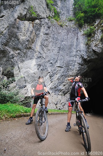 Image of friendshiop outdoor on mountain bike