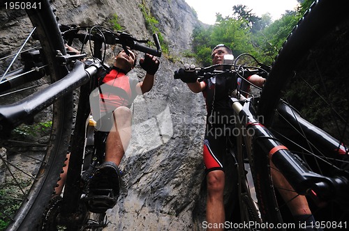 Image of friendshiop outdoor on mountain bike