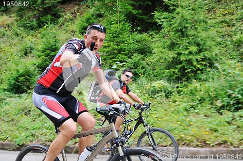 Image of friendshiop outdoor on mountain bike