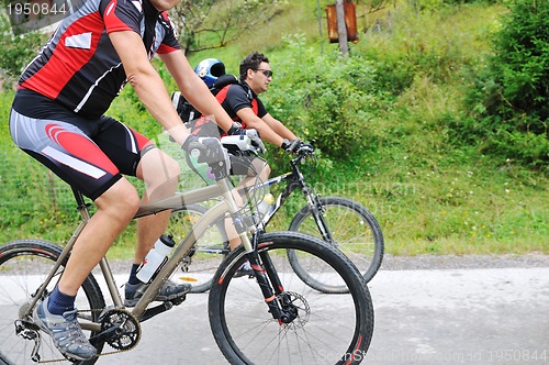 Image of friendshiop outdoor on mountain bike