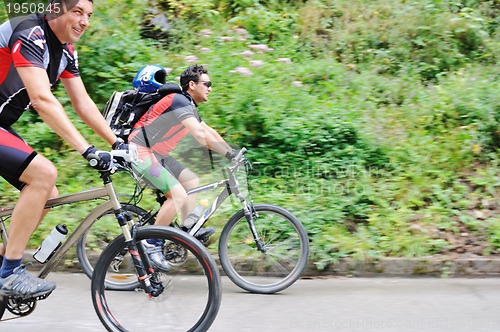 Image of friendshiop outdoor on mountain bike