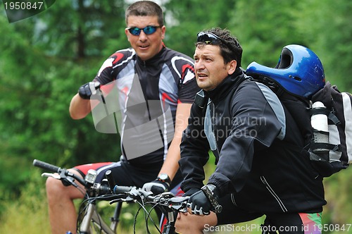 Image of friendshiop outdoor on mountain bike