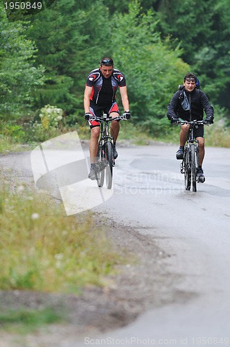 Image of friendshiop outdoor on mountain bike