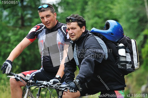 Image of friendshiop outdoor on mountain bike