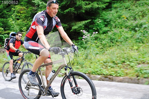 Image of friendshiop outdoor on mountain bike