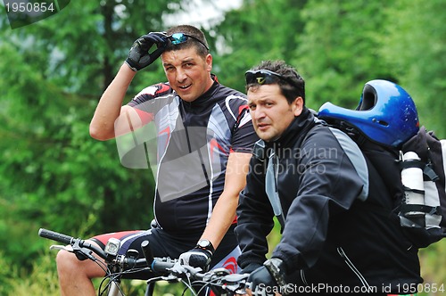 Image of friendshiop outdoor on mountain bike