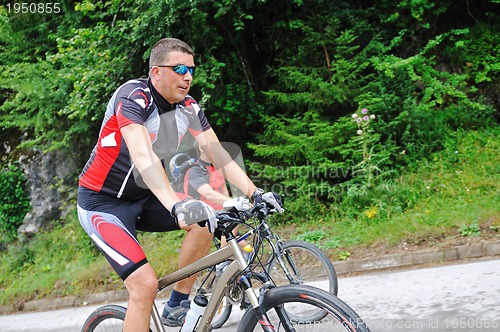 Image of friendshiop outdoor on mountain bike