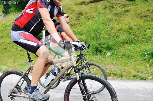 Image of friendshiop outdoor on mountain bike