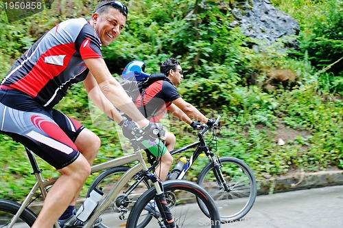 Image of friendshiop outdoor on mountain bike