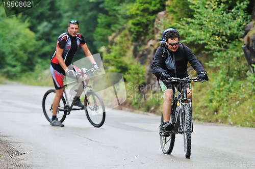 Image of friendshiop outdoor on mountain bike