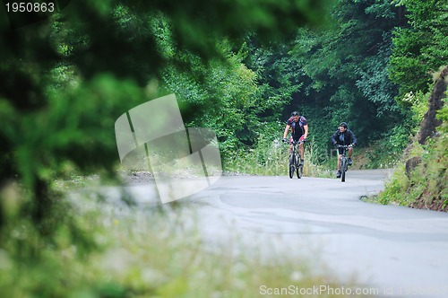 Image of friendshiop outdoor on mountain bike