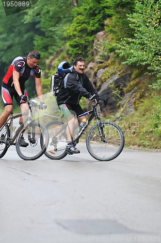 Image of friendshiop outdoor on mountain bike