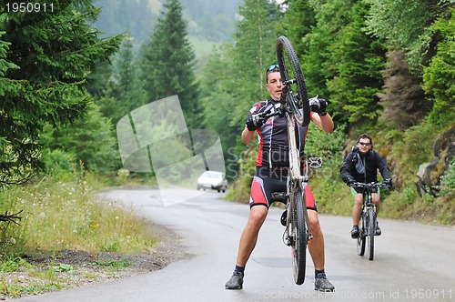 Image of friendshiop outdoor on mountain bike