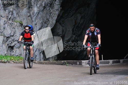 Image of friendshiop outdoor on mountain bike