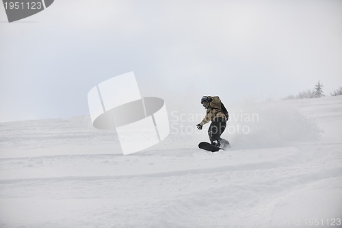 Image of freestyle snowboarder