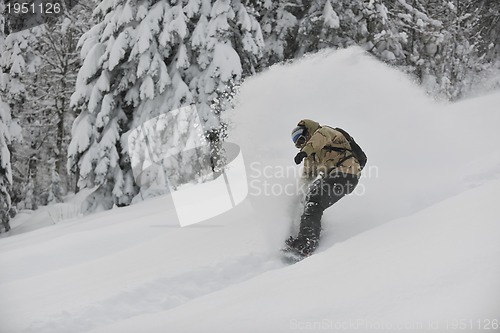 Image of freestyle snowboarder