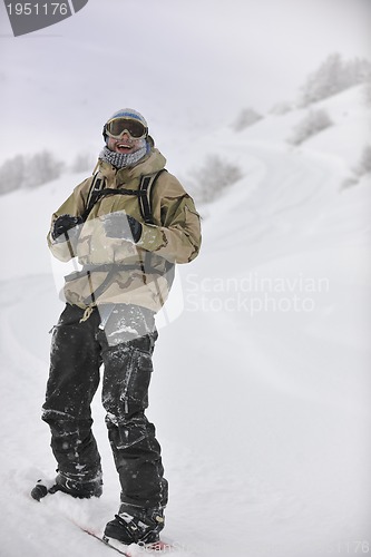 Image of happy snowboarder portrait