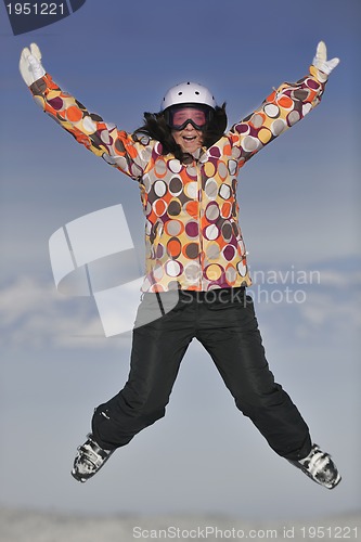 Image of happy woman on sunny winter day