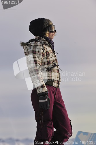 Image of happy woman on sunny winter day