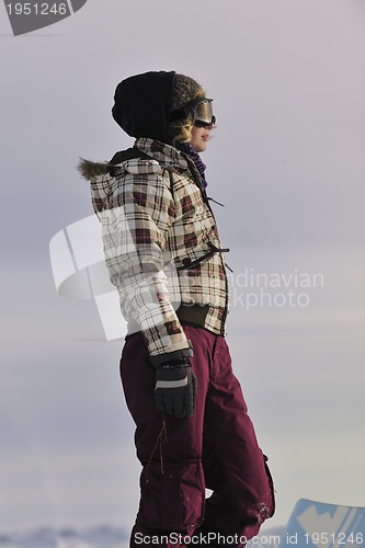 Image of happy woman on sunny winter day