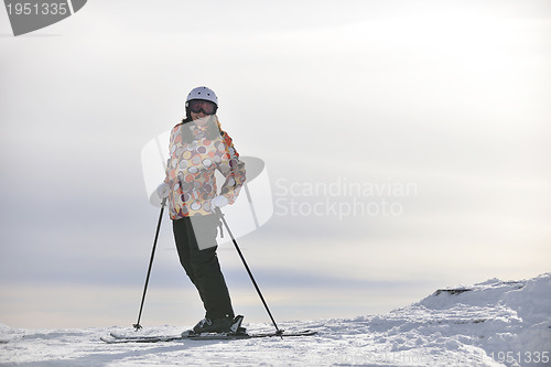 Image of happy woman on sunny winter day