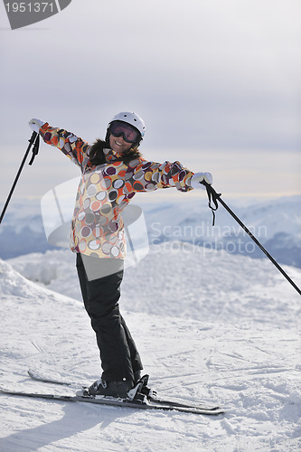 Image of happy woman on sunny winter day