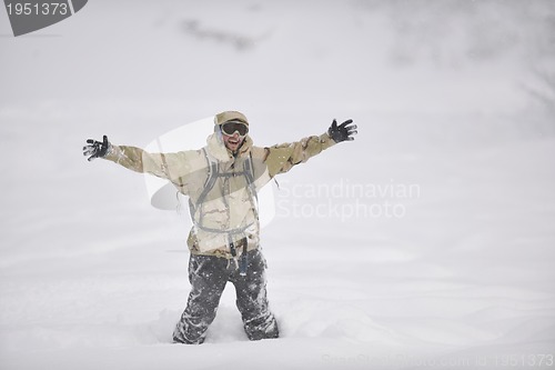 Image of happy snowboarder portrait