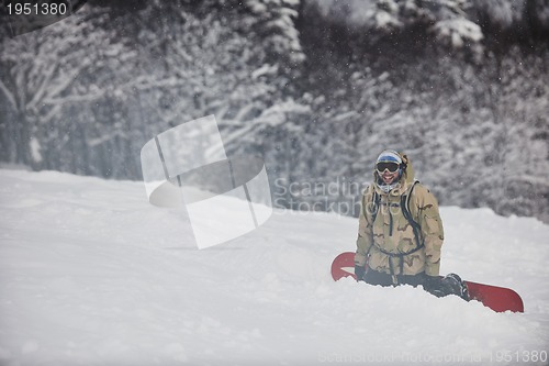 Image of happy snowboarder portrait