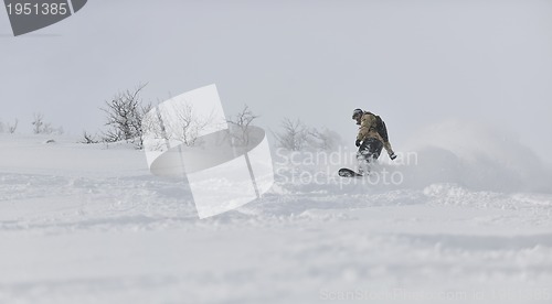 Image of freestyle snowboarder