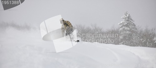 Image of freestyle snowboarder