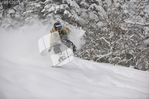 Image of freestyle snowboarder