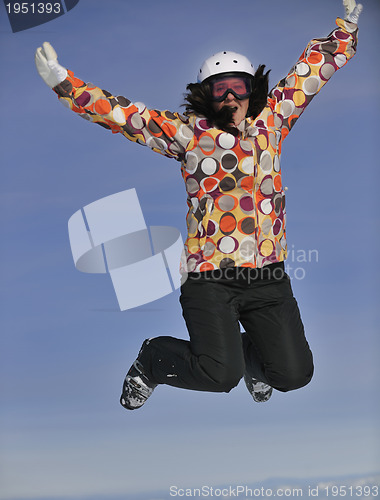 Image of happy woman on sunny winter day