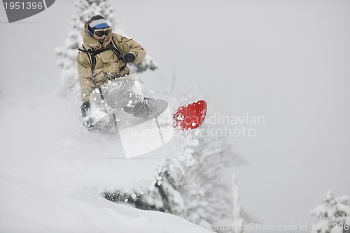 Image of freestyle snowboarder