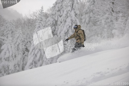 Image of freestyle snowboarder