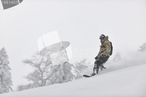 Image of freestyle snowboarder