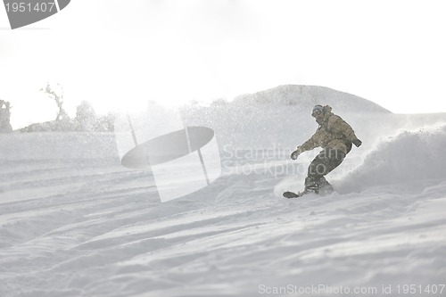 Image of freestyle snowboarder