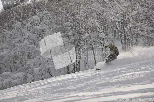 Image of freestyle snowboarder