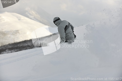 Image of freestyle snowboarder